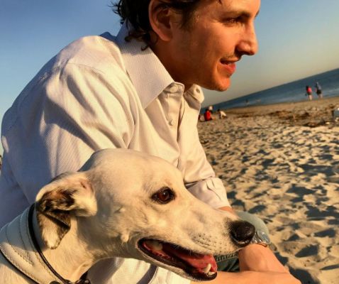 Ramzi Habibi with his family dog, Hemingway.